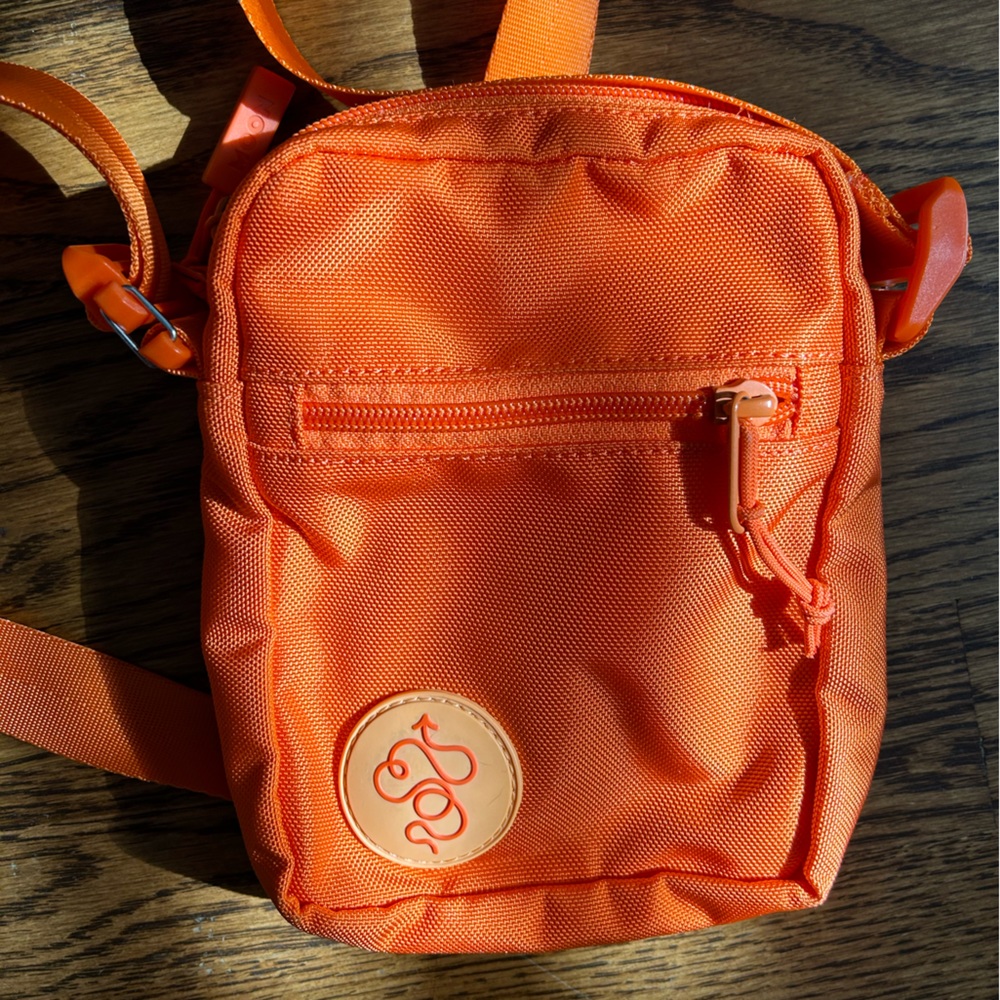 Baboon to the Moon orange crossbody bag